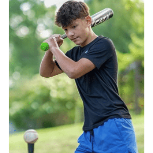 From Babe Ruth to Smart Bats: The Evolution of the Baseball Swing (and How to Help Your Kid Keep Up) 7 Amazon image: Young man hitting off Tee